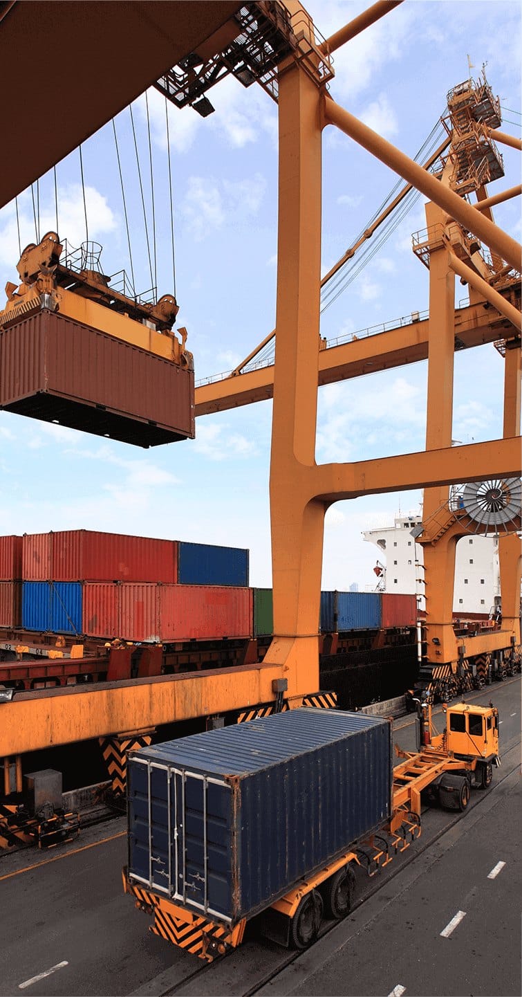 Container terminal with gantry cranes loading shipping containers